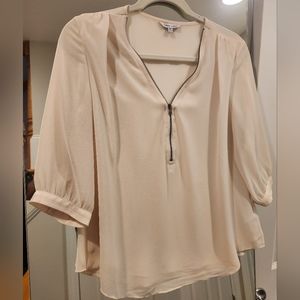 Sheer blouse with zipper neckline
